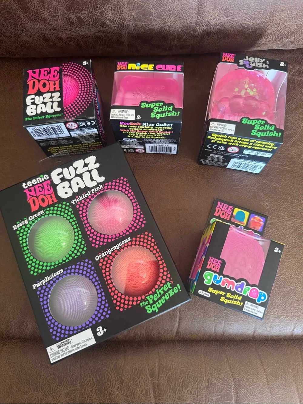 NeeDoh Kids Fuzz Ball & Squishy Toy Set - Pink, Green, Purple, Orange